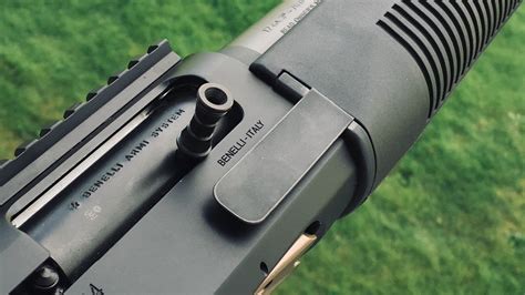 benelli m4 bolt release button.